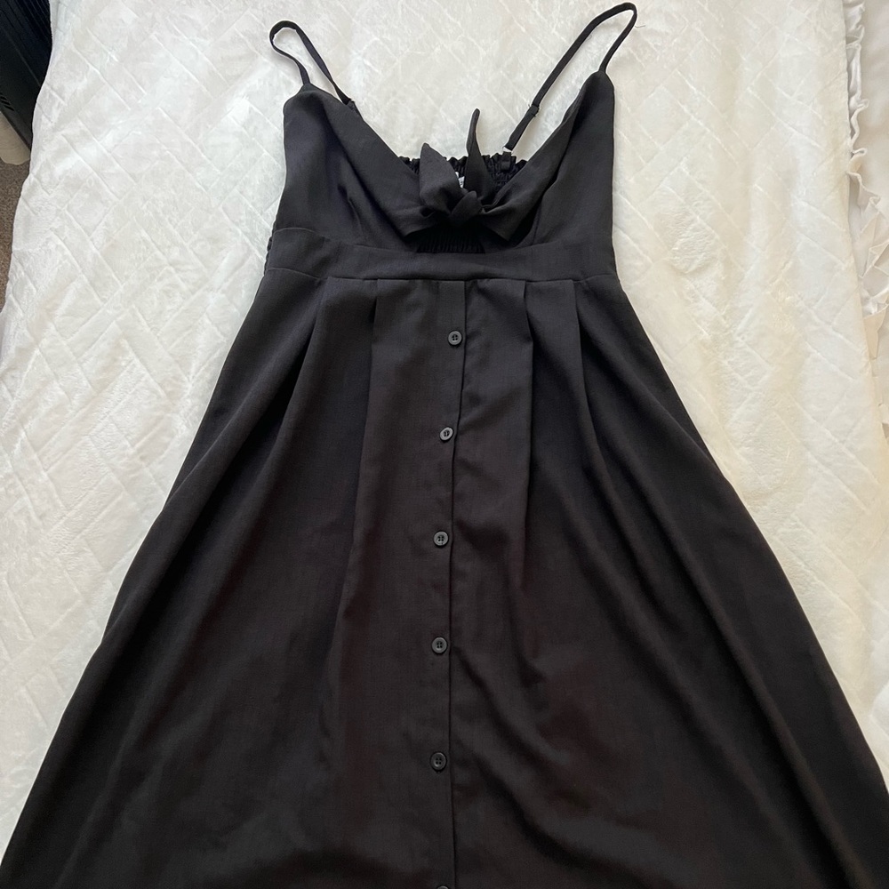 Black midi sundress with adjustable keyhole in bust.